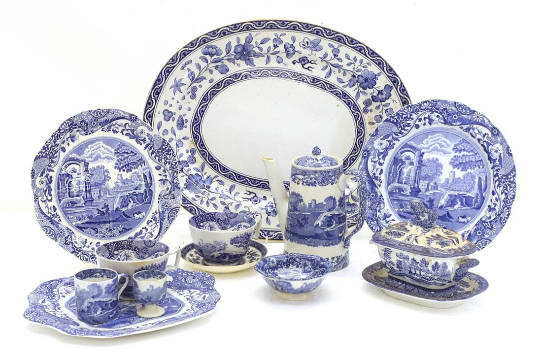 A large quantity of blue and white transferware,: A large quantity of blue and white transferware, to include a meat platter, decorated with figures by a lake within an Arcadian scene, impressed 'COPELAND', a small tureen on stand, decorated in the w