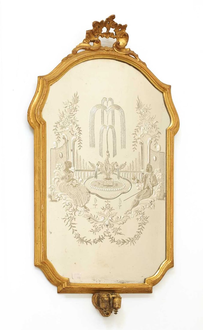 A gilt framed girandole wall mirror, 19th century,: A gilt framed girandole wall mirror, 19th century, the shaped plate etched with a garden fountain flanked by a couple in 18th century dress, with