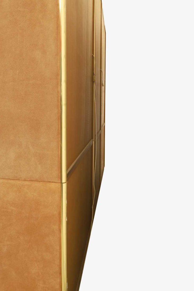 Manner of Renato Zevi, a brass and orange suede wall cabinet, - 10