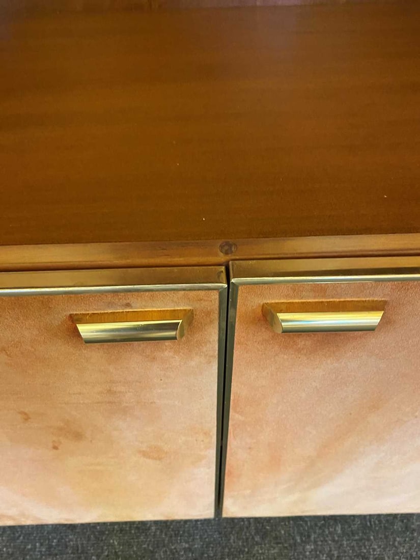 Manner of Renato Zevi, a brass and orange suede wall cabinet, - 16