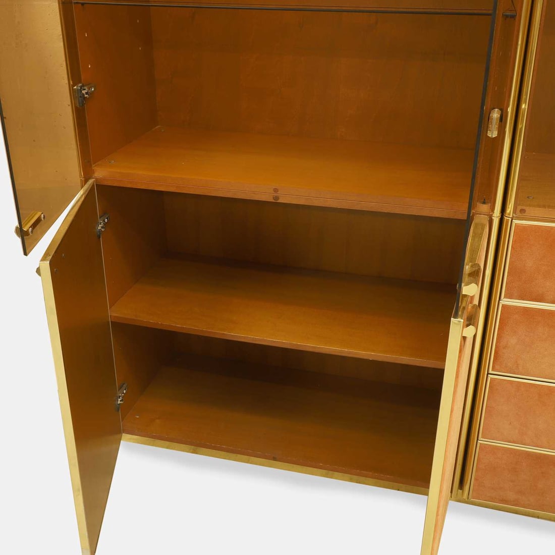 Manner of Renato Zevi, a brass and orange suede wall cabinet, - 4