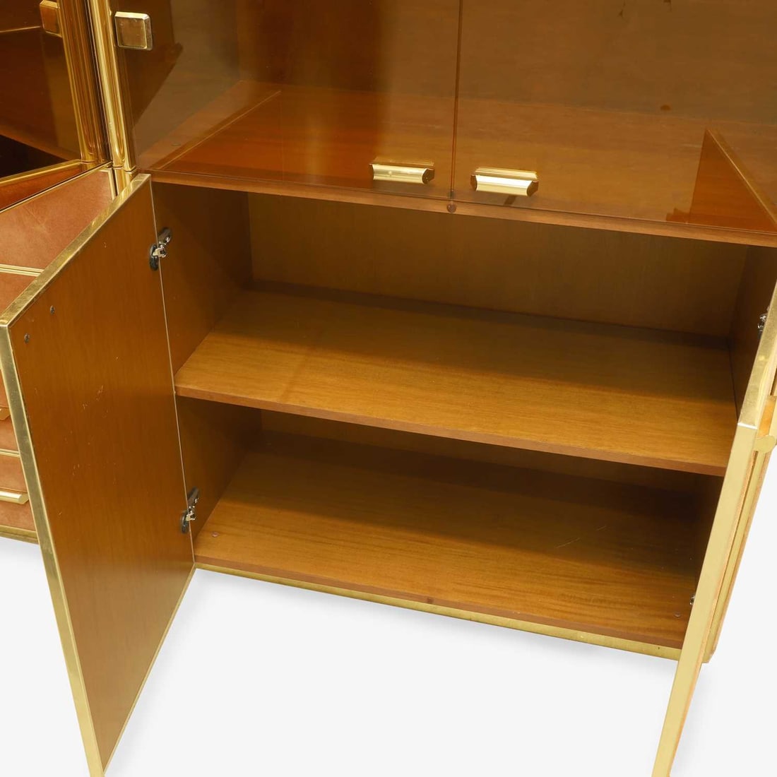 Manner of Renato Zevi, a brass and orange suede wall cabinet, - 7