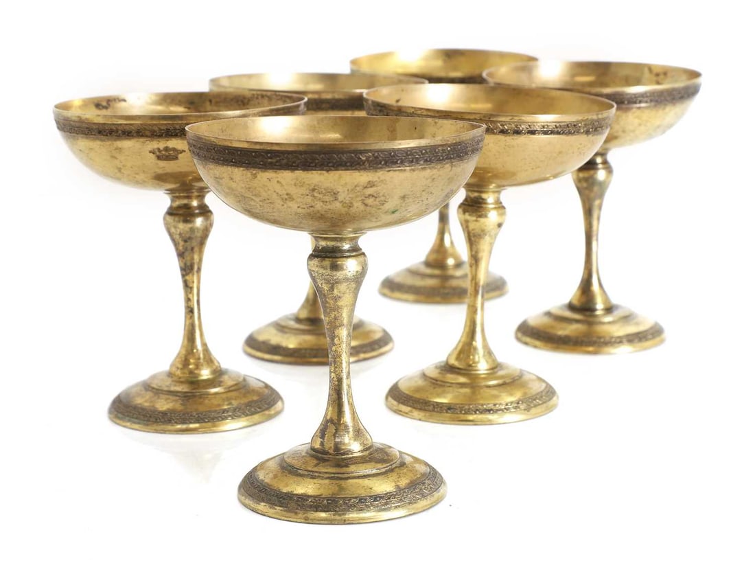 A set of six silver coupe glasses, - 2