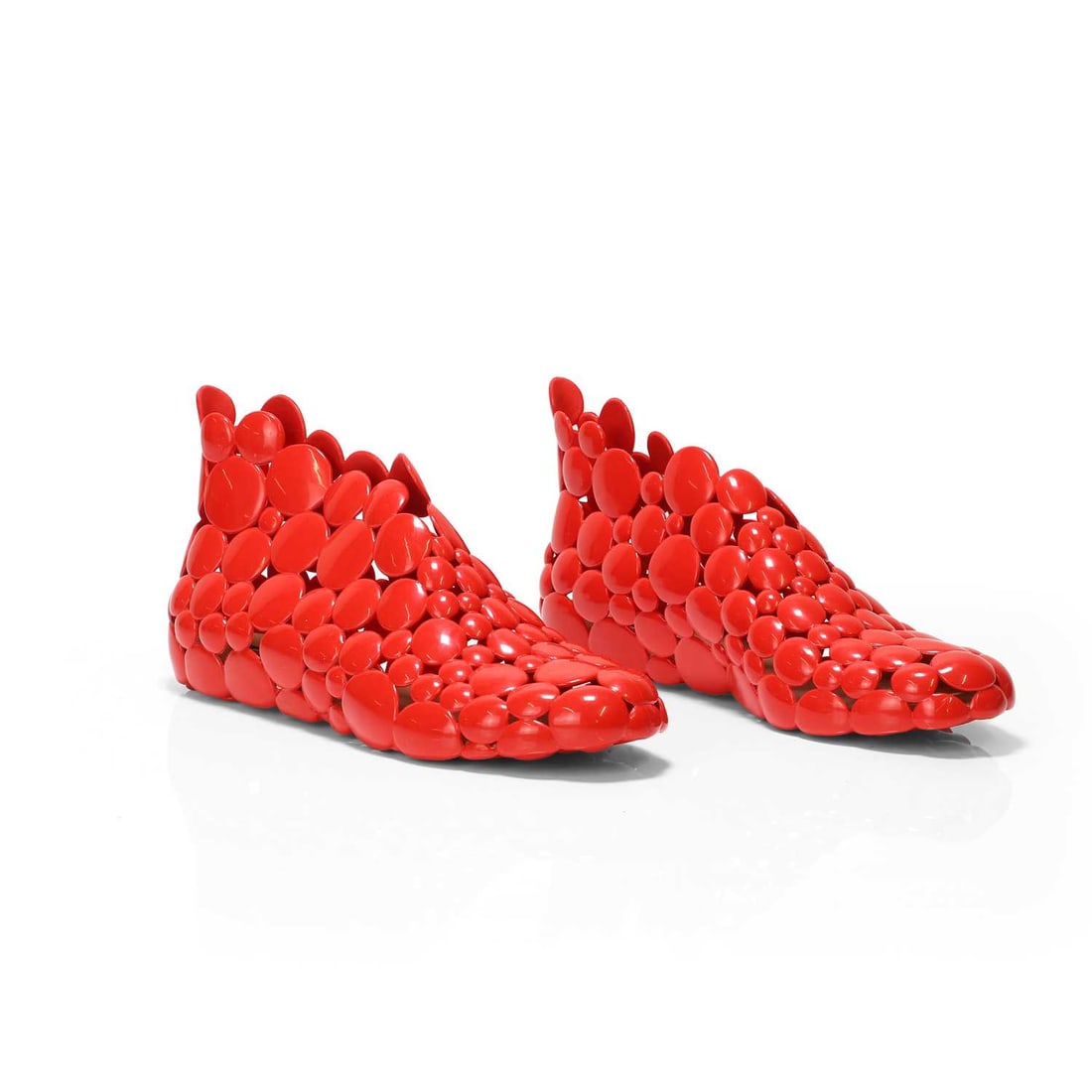 Gaetano Pesce (Italian, 1939-2024) for Melissa, a collection of 'Fontessa' footwear,: Gaetano Pesce (Italian, 1939-2024) for Melissa, a collection of 'Fontessa' footwear, comprising: 2010, both pairs constructed from red and black translucent recyclable PVC Melflex®, size stated U