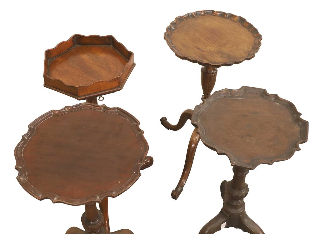A collection of four mahogany tripod wine tables, 19th century, - 2