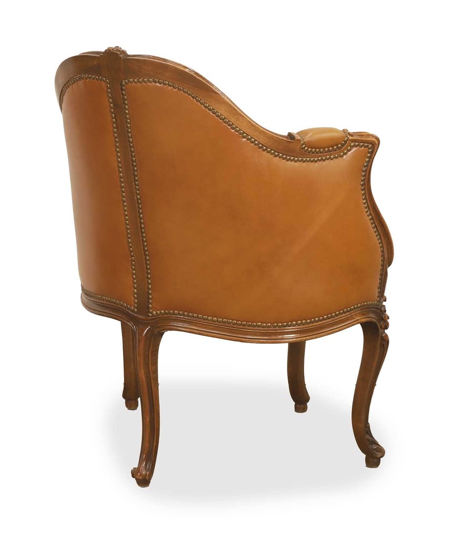 A walnut and leather button-back chair, - 2