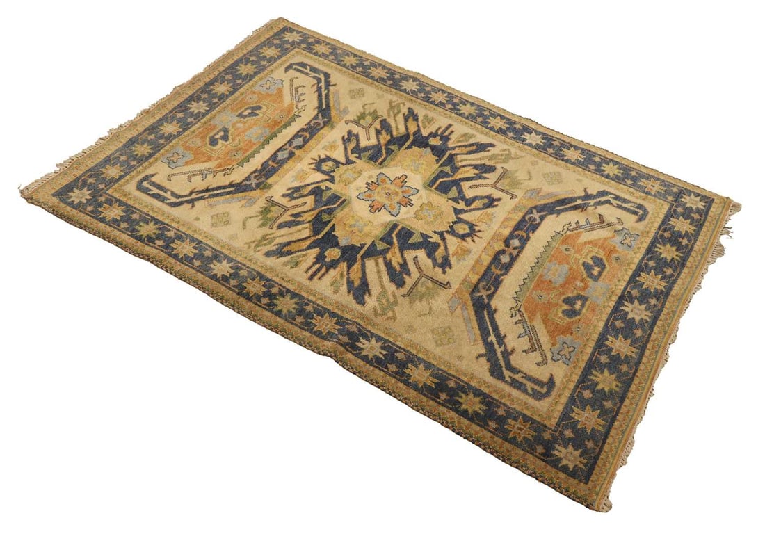 A Turkish Kazak, 20th century,: A Turkish Kazak, 20th century, Caucasian with yellow ground, and a large blue central medallion, 201 x 138cm