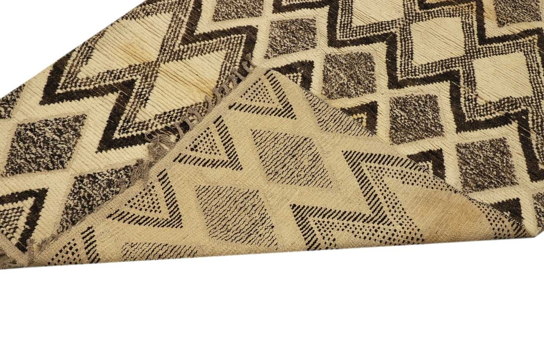 A Berber style wool rug, - 8