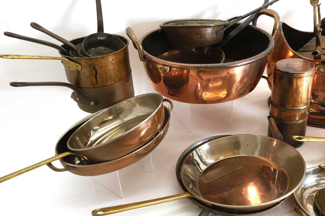 A collection of copper pans and vessels, - 2