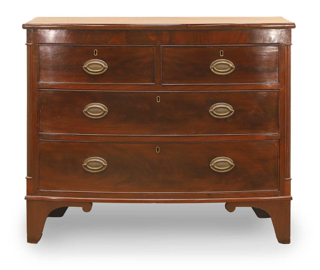 A George III mahogany bow front chest of drawers, early 19th century, (1 of 2)
