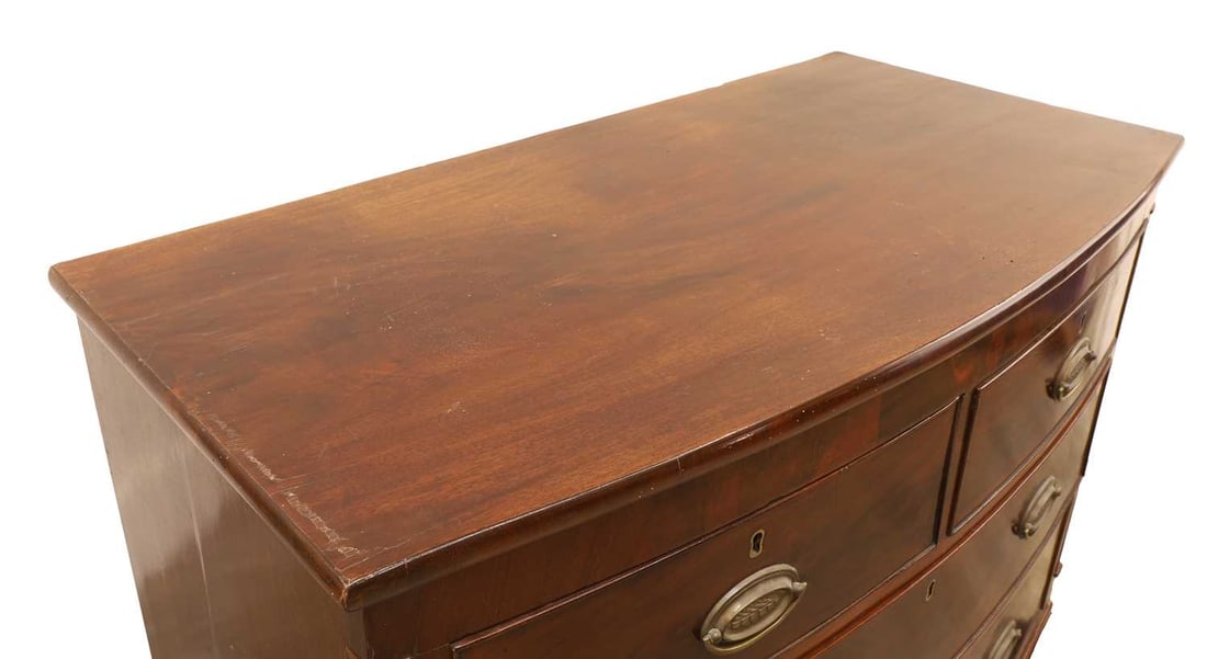 A George III mahogany bow front chest of drawers, early 19th century, - 2