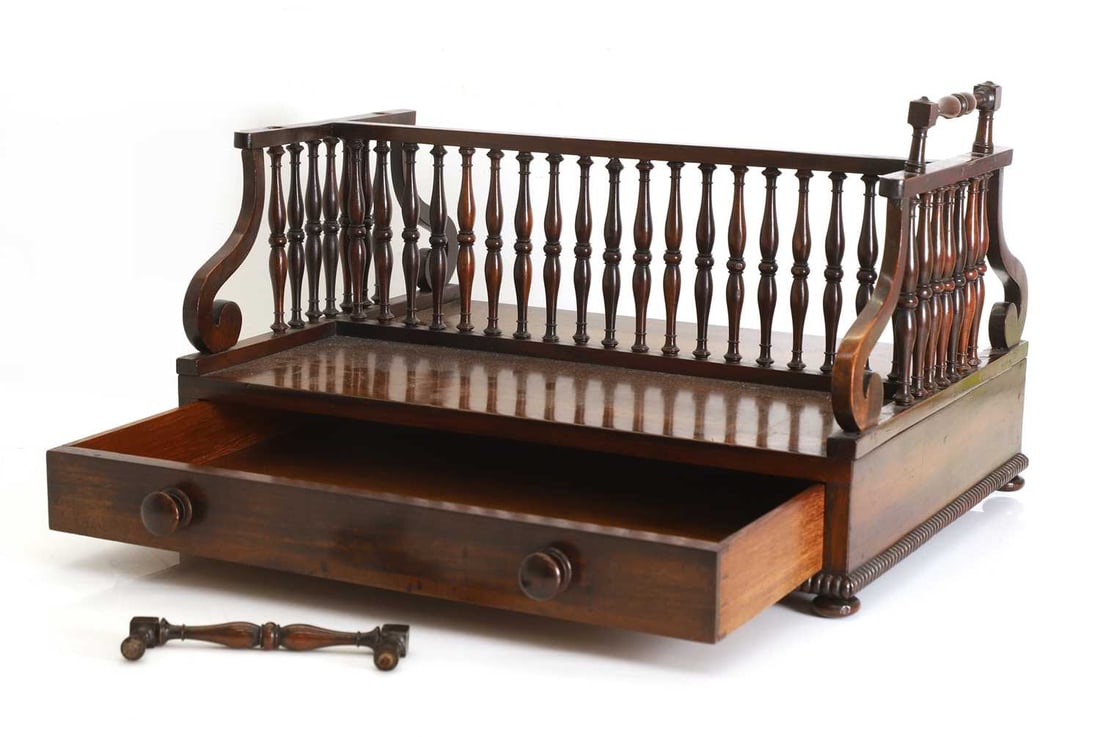 A Regency rosewood double sided book trough, 19th century, - 2