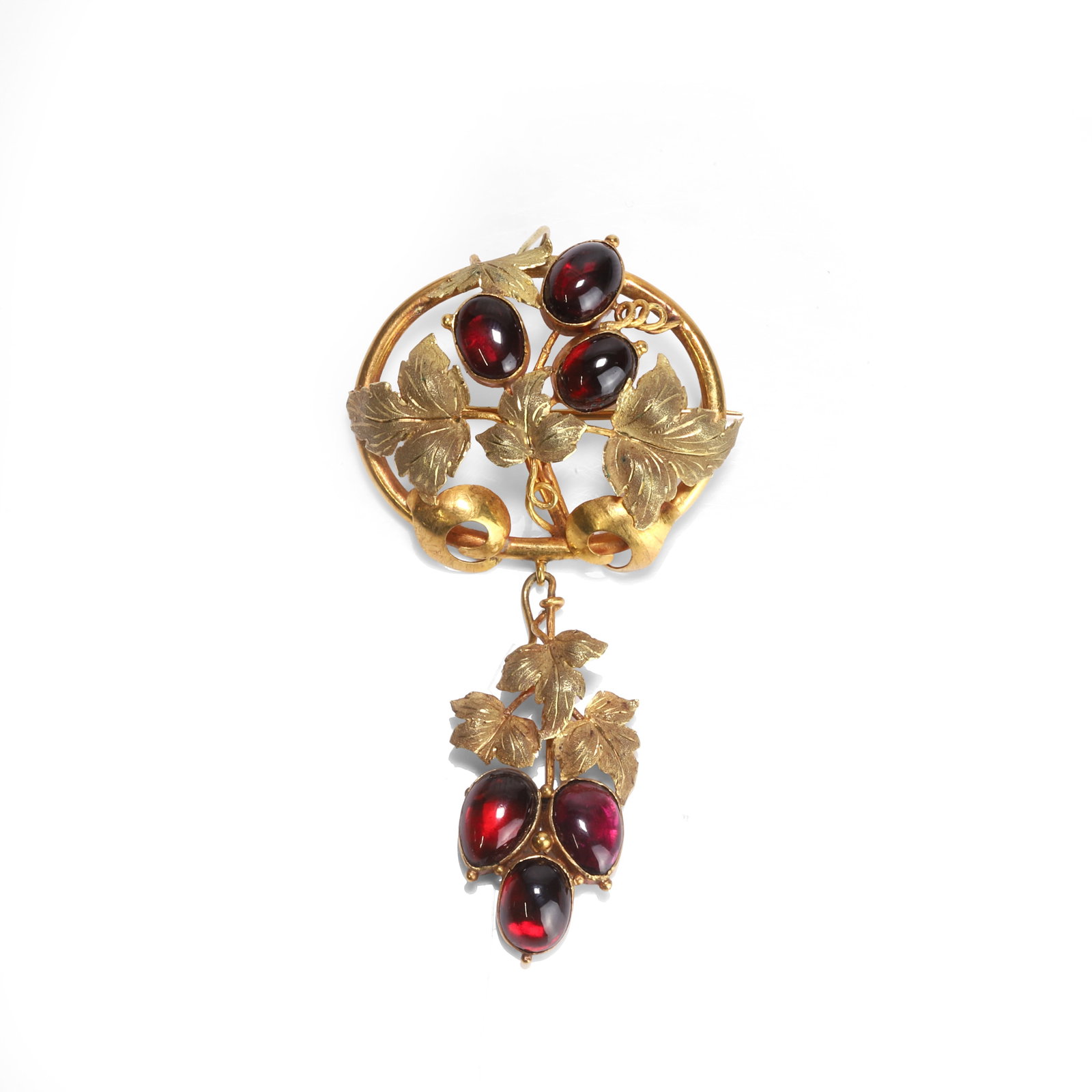 A Victorian cabochon garnet pendant brooch,: A Victorian cabochon garnet pendant brooch, of oval open form with applied leaves and three oval cabochon garnets, with hinged pin and 'C' hook fitting and plain wire pendant bale, suspending a detach