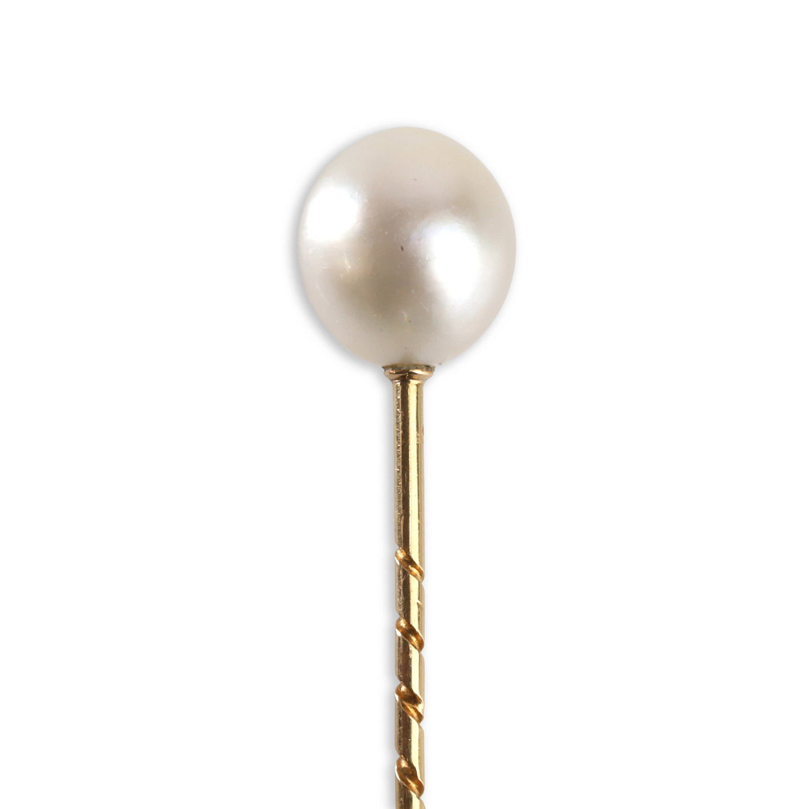 Cartier, a natural pearl stick pin,: Cartier, a natural pearl stick pin, the oval shaped pearl, mounted upon a gold pin, engraved Cartier N.Y. (Measuring approximately 9.2 x 10.1mm; 2.68g) Condition Report: A verbal report by GCS states 