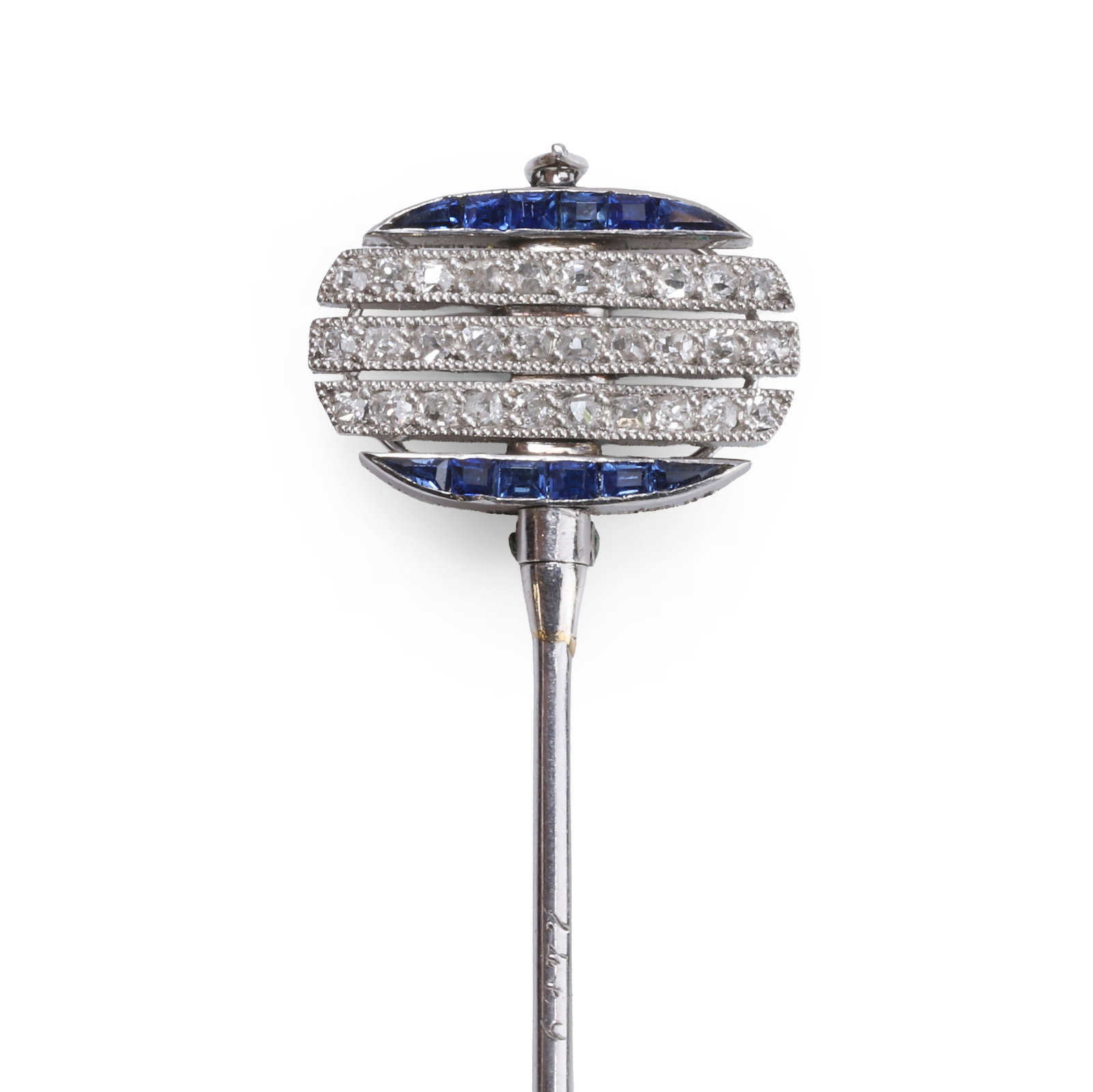 Cartier, an Art Deco sapphire and diamond double-sided stick pin,: Cartier, an Art Deco sapphire and diamond double-sided stick pin, openwork panel of convertible, double-sided design, featuring rows of old-cut diamonds and channels of calibré-cut sapphires on a