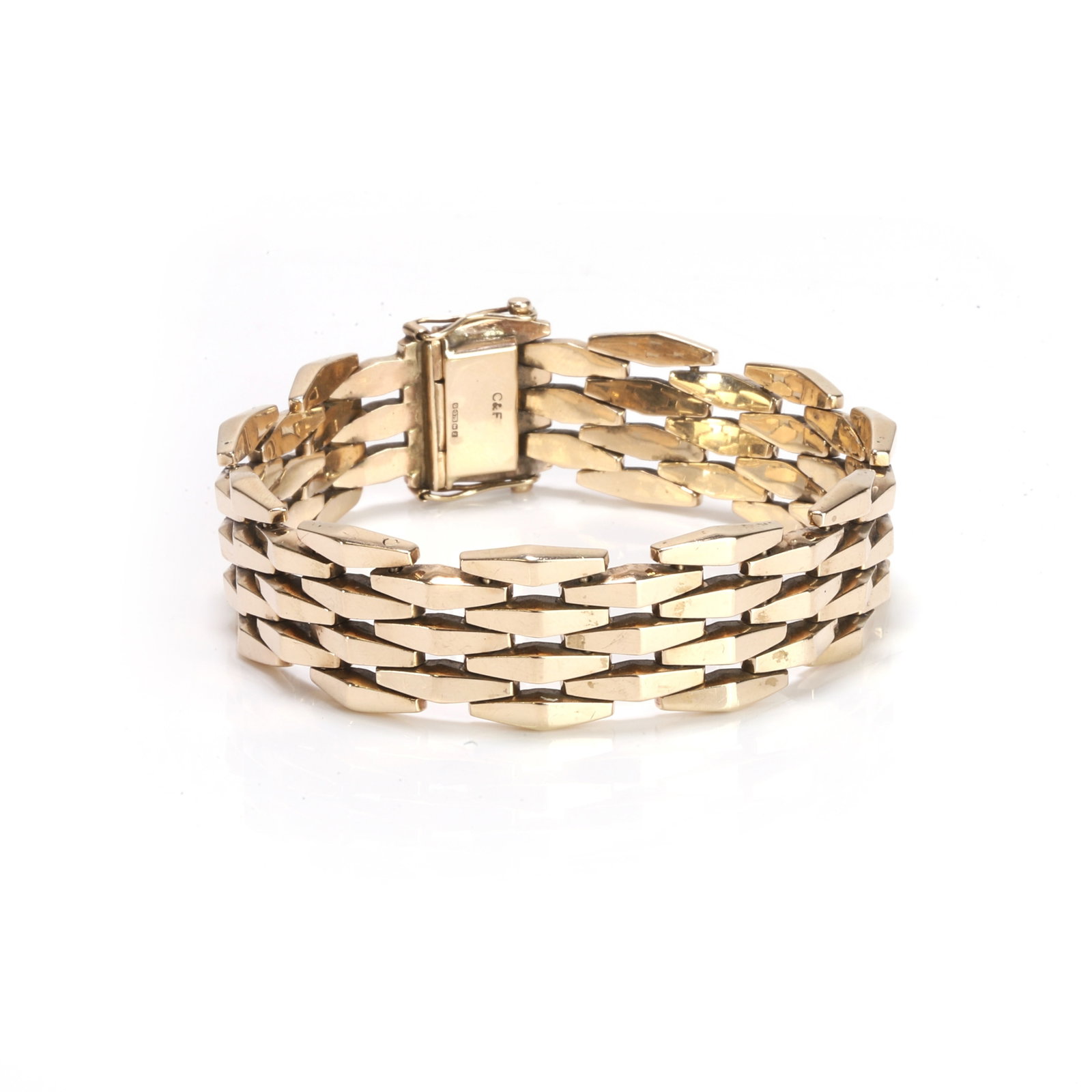 Cropp & Farr, a 9ct gold faceted link bracelet,: Cropp & Farr, a 9ct gold faceted link bracelet, with four rows of solid faceted links, to a semi-concealed box clasp and two figure of eight catches, Birmingham 1974 (Length 19.5cm; width 1.7cm; 69.2g
