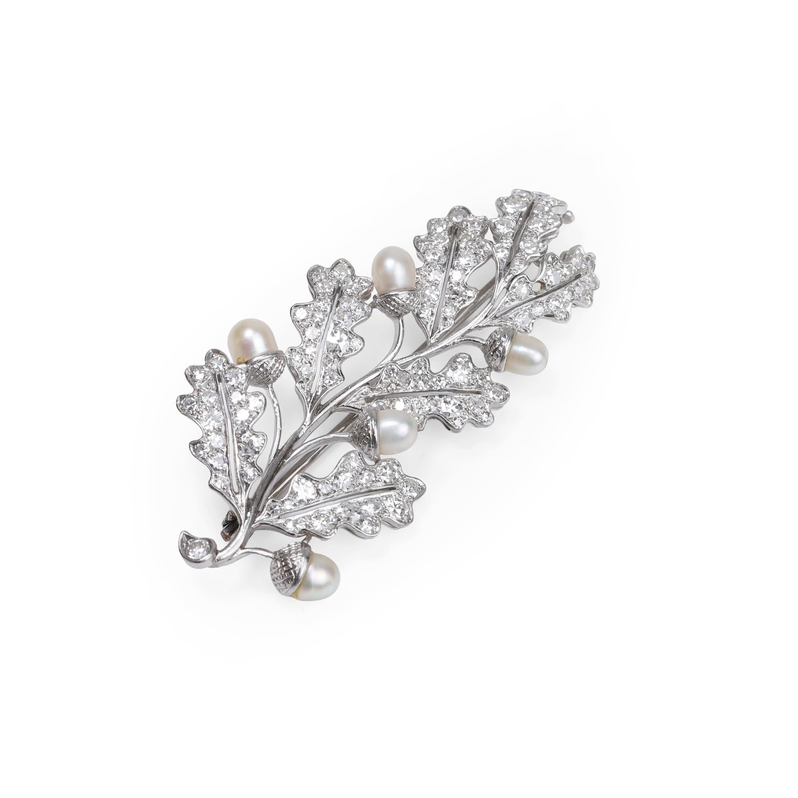 A diamond and pearl brooch,: A diamond and pearl brooch, the oak leaf and acorn motifs decorated with barrel shaped cultured freshwater pearls and grain set with single cut diamonds, one missing, to a wire gallery with hinged pin