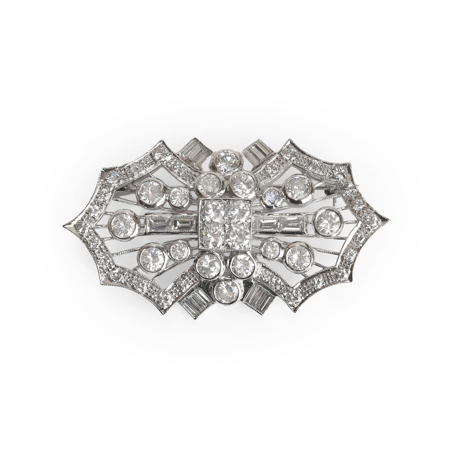 A diamond plaque brooch,: A diamond plaque brooch, of geometric bow shaped form, comprising round brilliant cut and baguette cut diamonds radiating from a central square of grain set diamonds, to an open wirework frame and rou