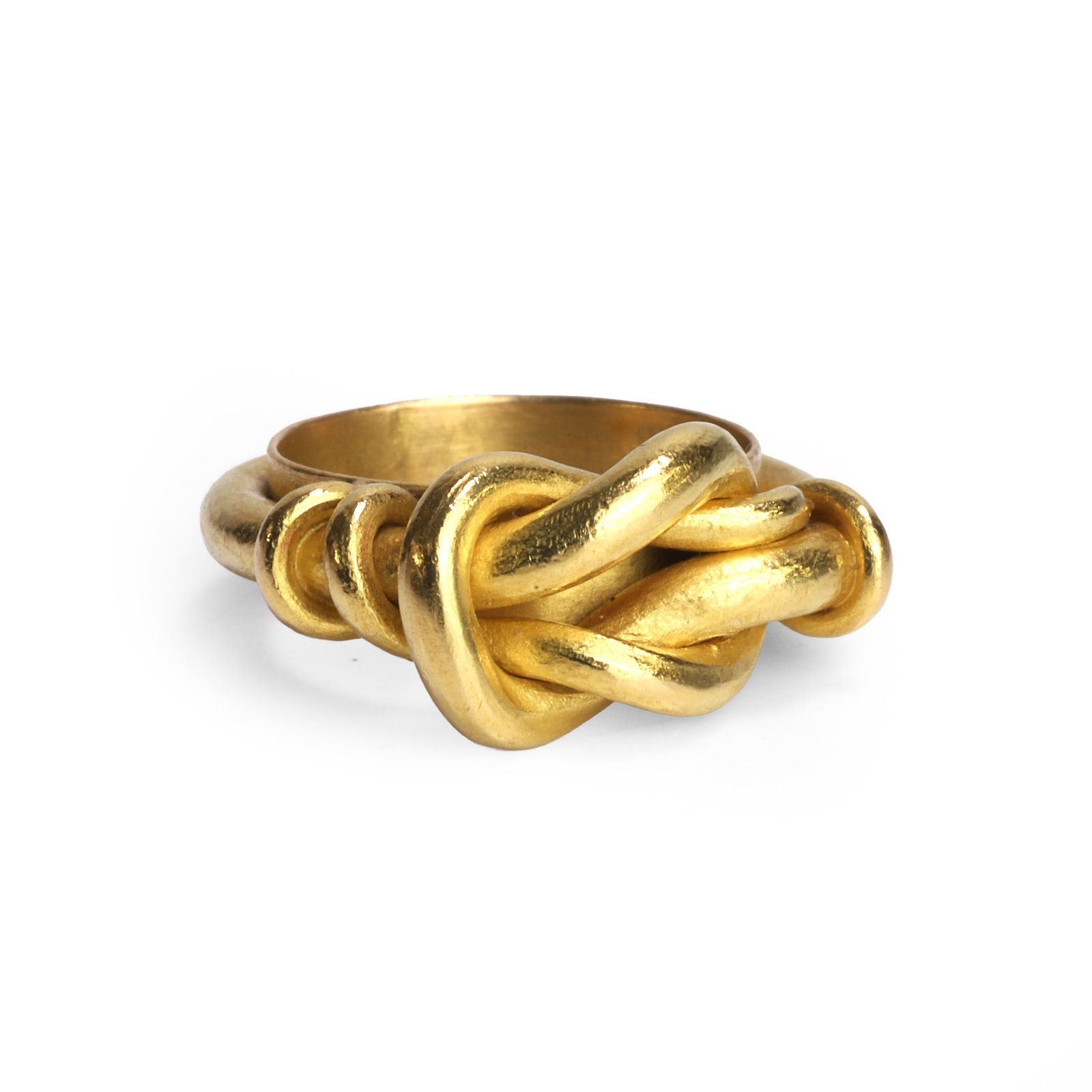 A high carat gold knot design ring,: A high carat gold knot design ring, the forged lovers knot ring, wrapped and mounted upon a flat band, in unmarked yellow metal, tested as approximately 21 to 22ct gold (Ring size G; 10.3g) Condition 