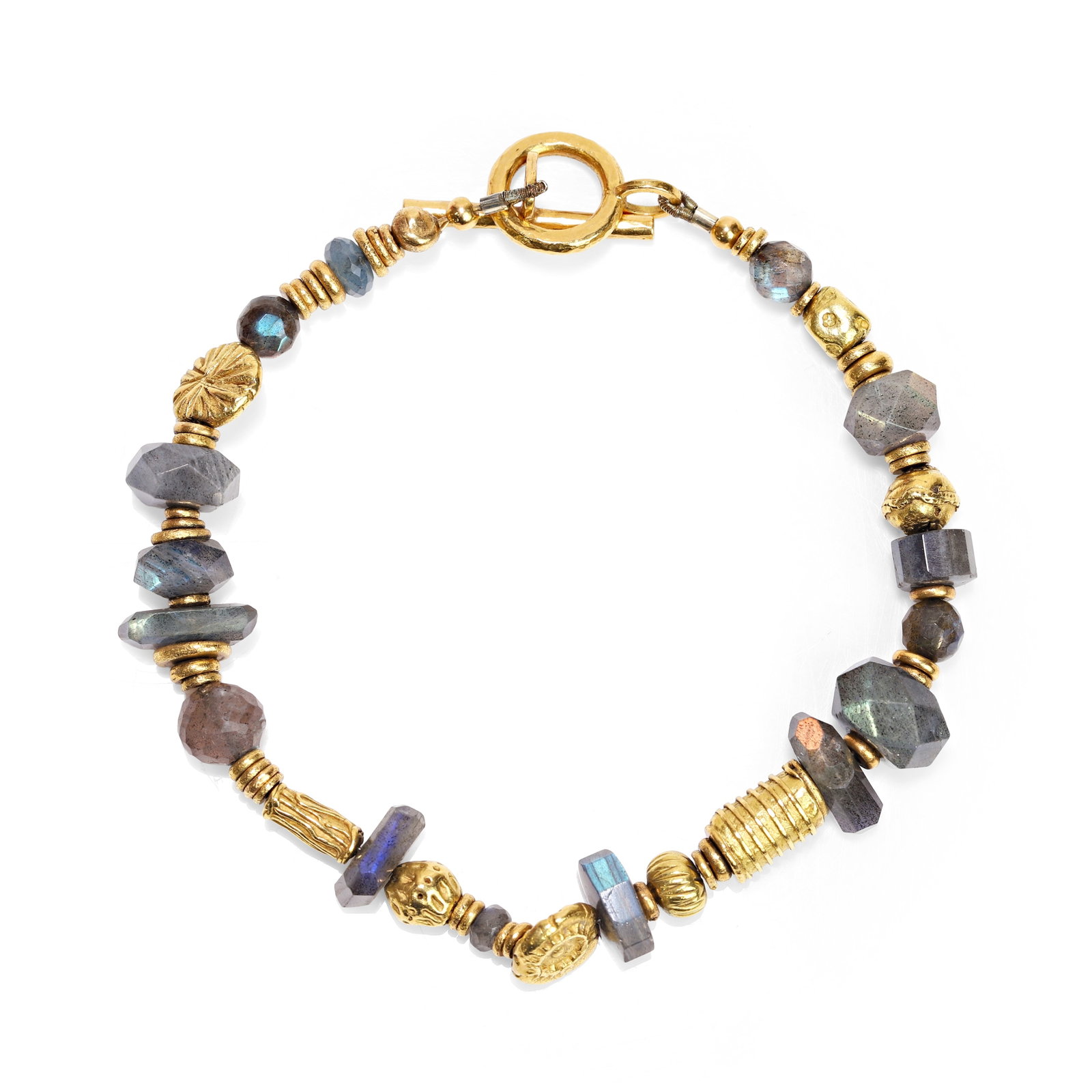 Polly Gasston, a 22ct gold and labradorite bead bracelet,: Polly Gasston, a 22ct gold and labradorite bead bracelet, composed of vari-shaped faceted labradorite beads and sets of textured gold spacers and rondels, leading to a toggle clasp. Maker's mark PG fo