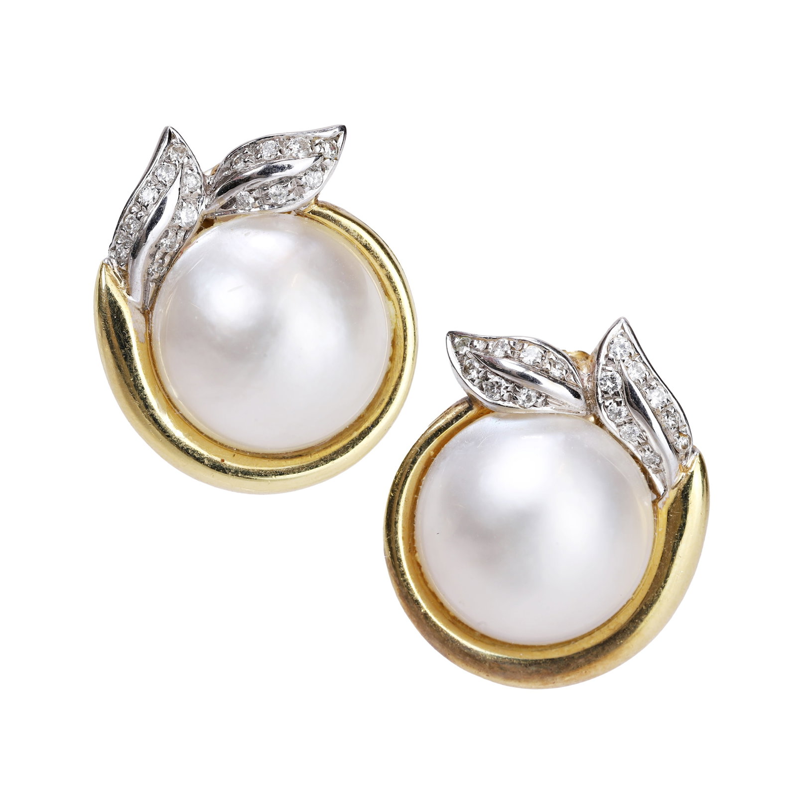 A pair of Mabe pearl and diamond clip on earrings,: A pair of Mabe pearl and diamond clip on earrings, each Mabe pearl with thread and grain set white gold leaf detail, to a pierced verso with pin and clip fitting. Stamped 18ct (Earring diameter 1.9cm;