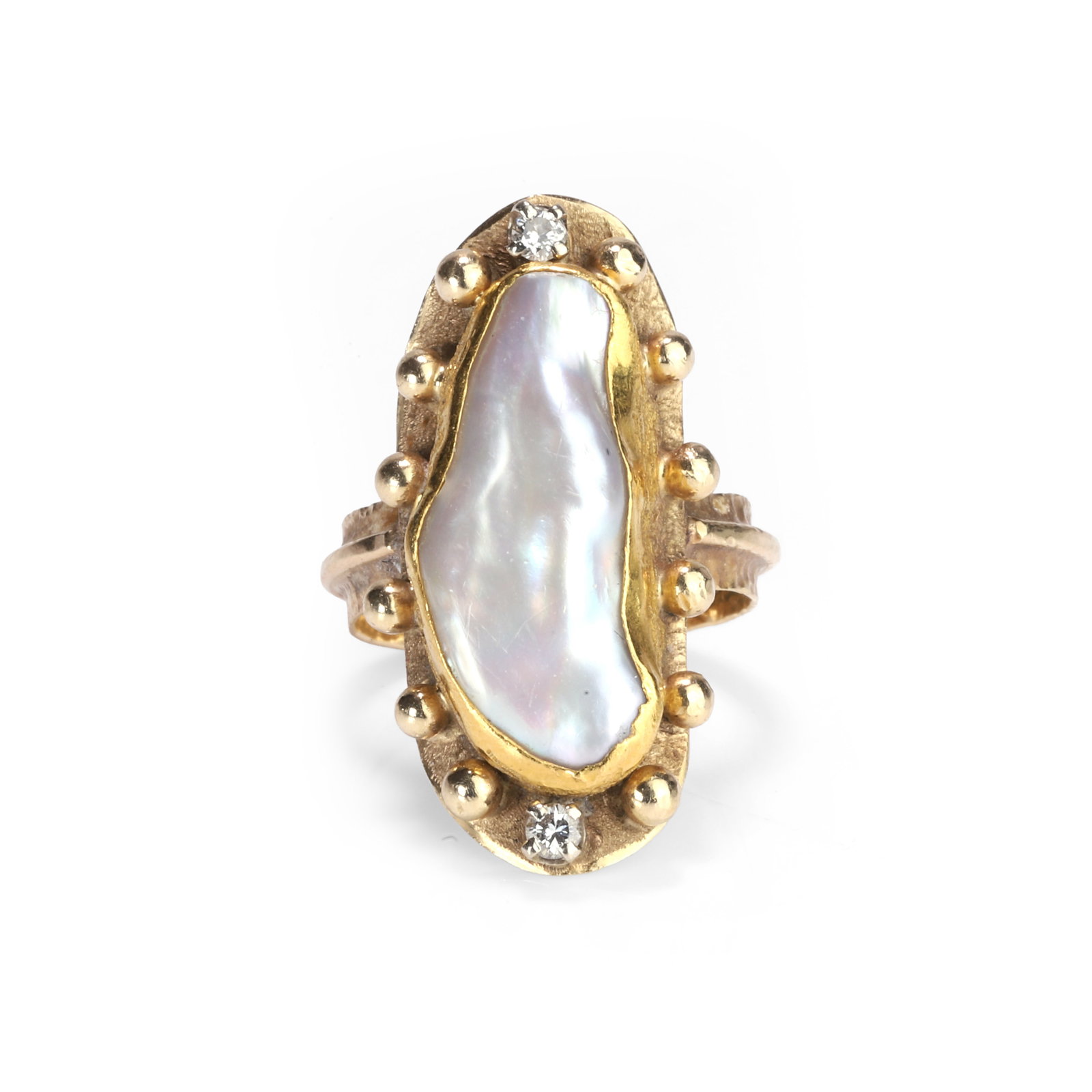 A baroque pearl ring,: A baroque pearl ring, featuring a large free form baroque pearl set within a beaded textured gold surround with two diamond accents, to a planished hoop with a central polished band. Unmarked and test