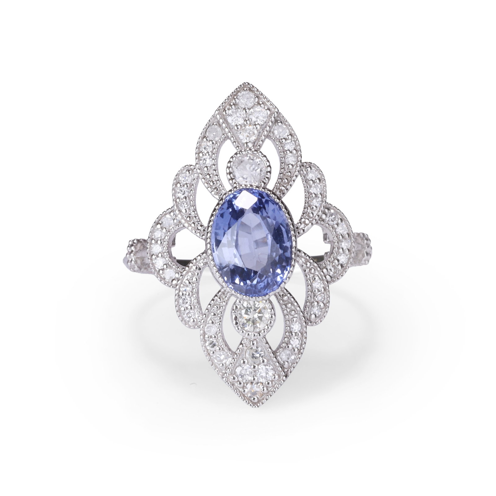 A sapphire and diamond dress ring,: A sapphire and diamond dress ring, the lozenge shape front pierced and set with an oval cut sapphire, with a round brilliant diamond above and below, further enhanced with smaller eight cut diamonds, 