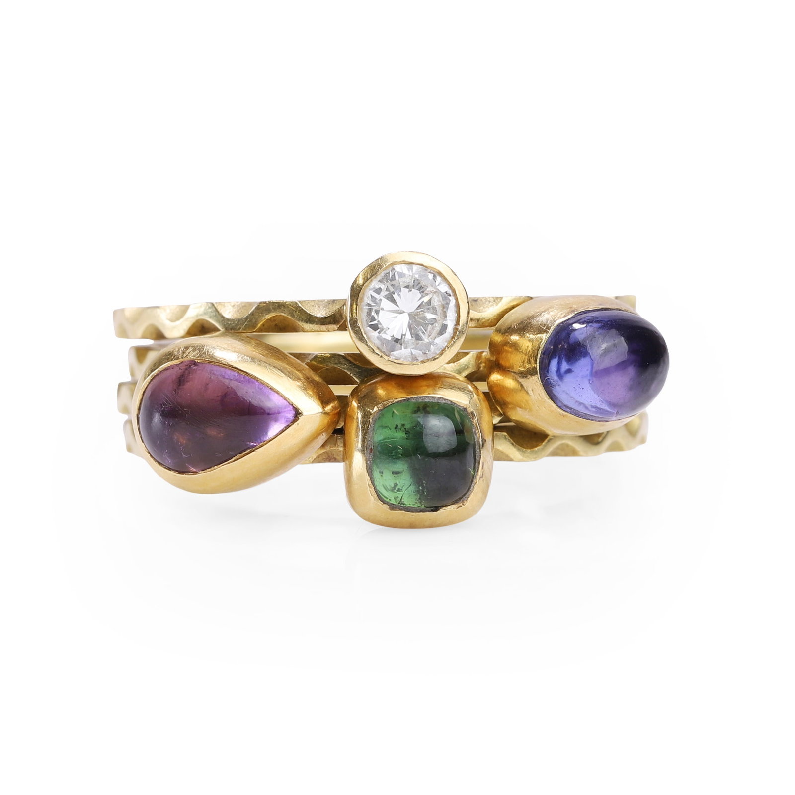 A set of four gemstone set stacking rings,: A set of four gemstone set stacking rings, comprising a round brilliant cut diamond and three cabochon coloured gemstone examples, each stone collet set to a wave design hoop, unmarked and testing as 