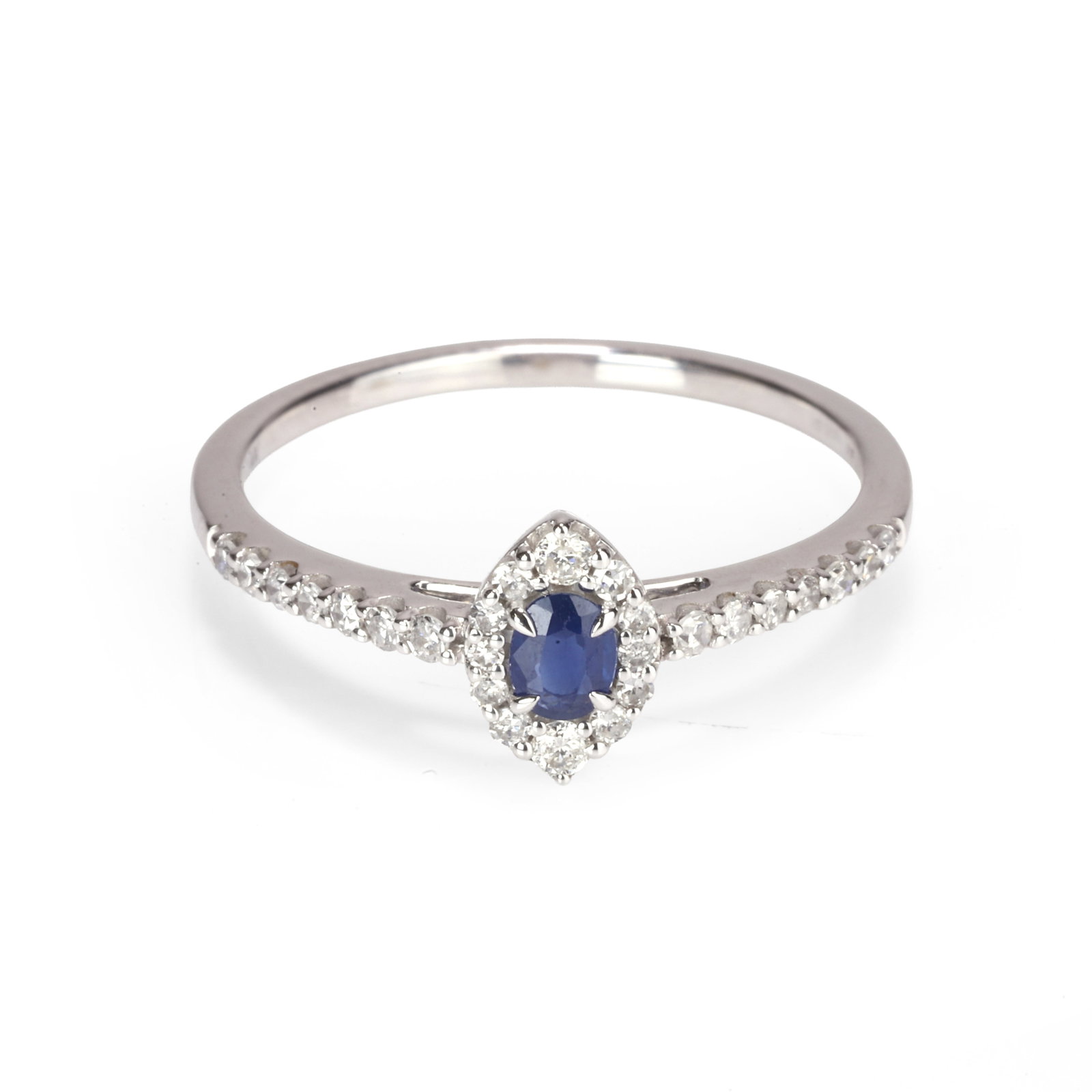 A 14ct white gold sapphire and diamond ring,: A 14ct white gold sapphire and diamond ring, the oval cut sapphire claw set within a navette shaped surround of single cut diamonds, between shoulders further set with single cut diamonds. Hallmarked 