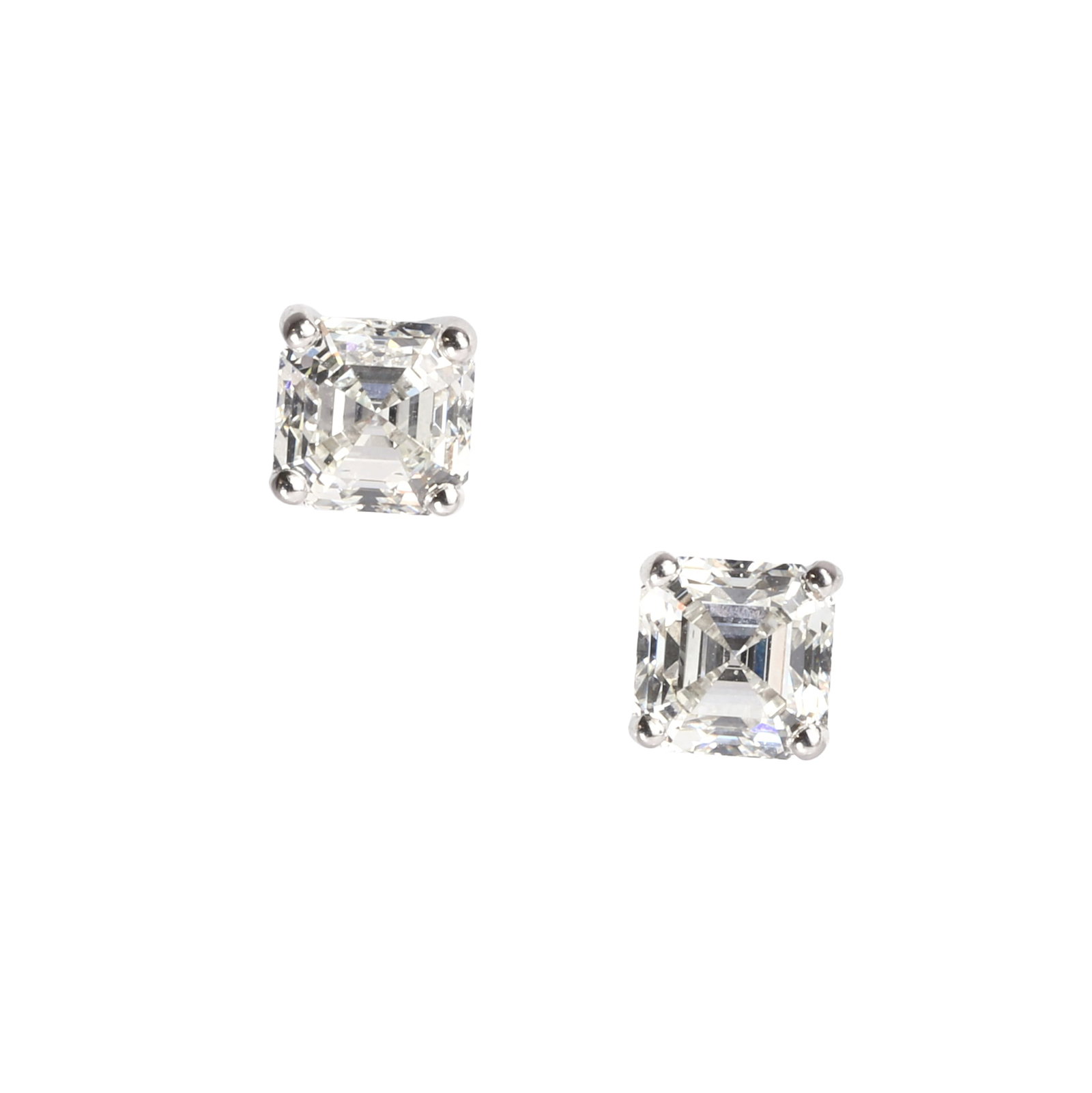 A pair of 18ct white gold Asscher cut diamond stud earrings,: A pair of 18ct white gold Asscher cut diamond stud earrings, each comprising an Asscher cut diamond claw set to post and butterfly fittings, hallmarked 750, London, stated weight on invoice 2.02ct. In