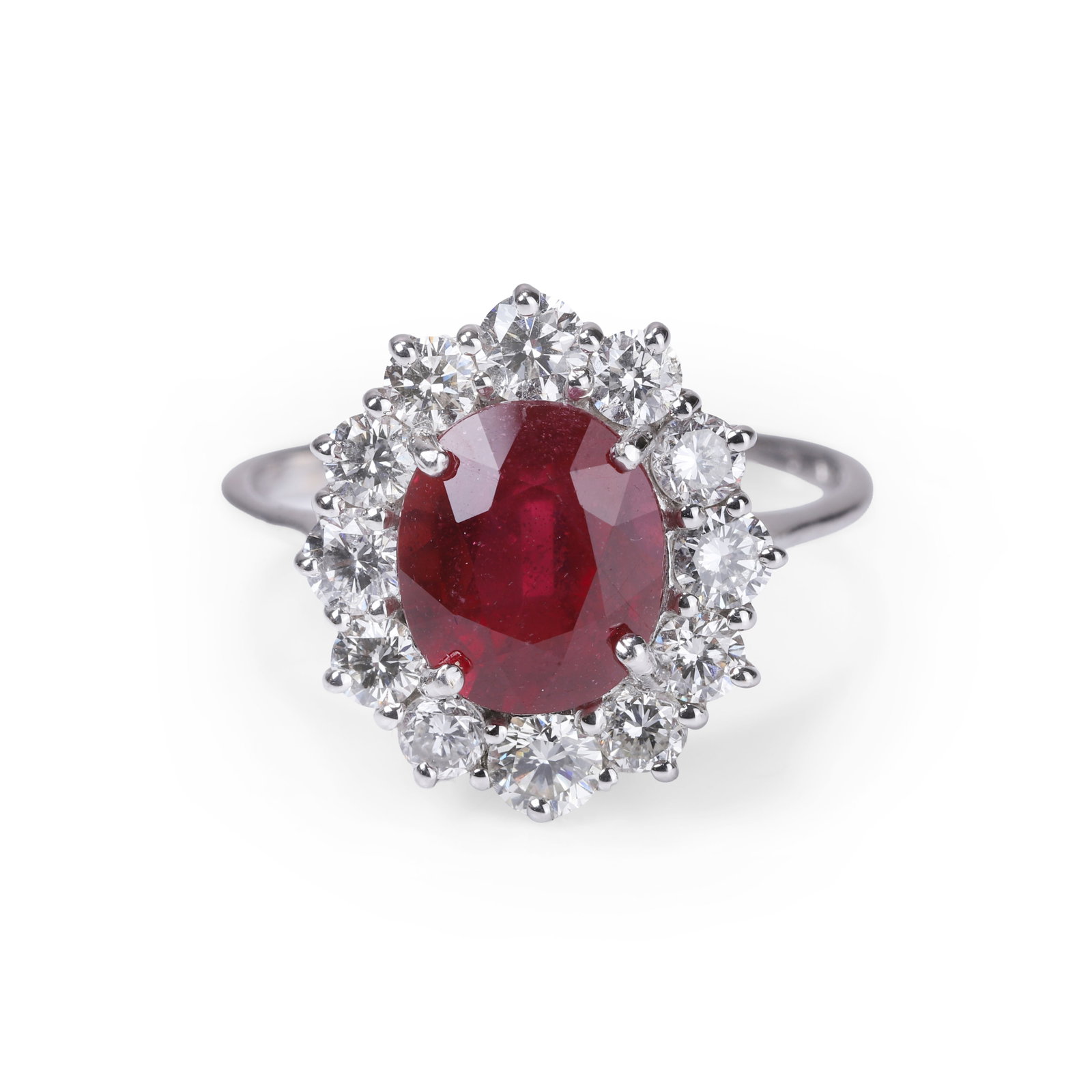 A ruby and diamond cluster ring, - 2