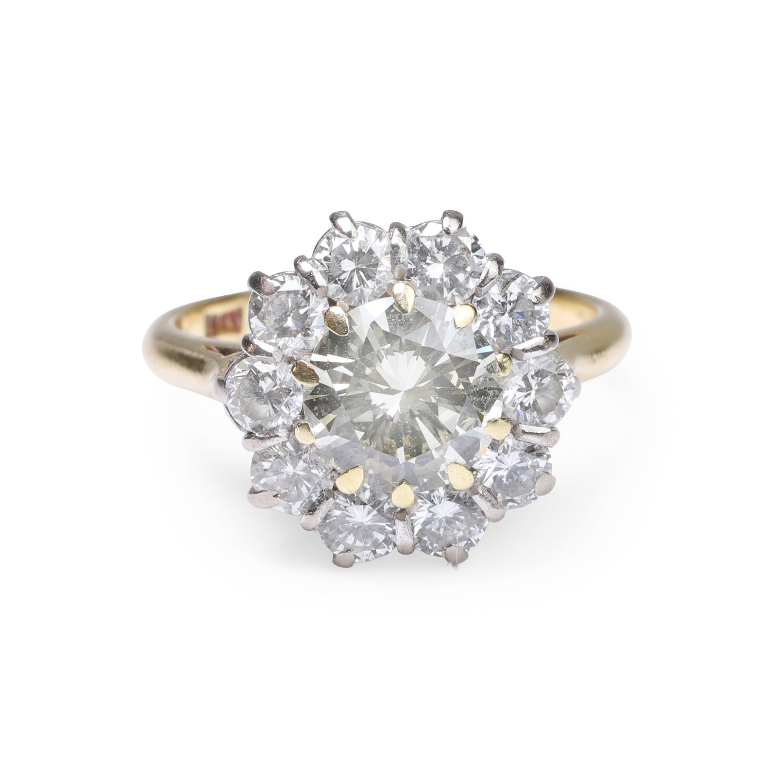 A diamond cluster ring,: A diamond cluster ring, the light yellow round brilliant cut diamond, estimated as approximately 1.70ct, set within a surround of round brilliant cut diamonds, all in claw settings to a white wire bas
