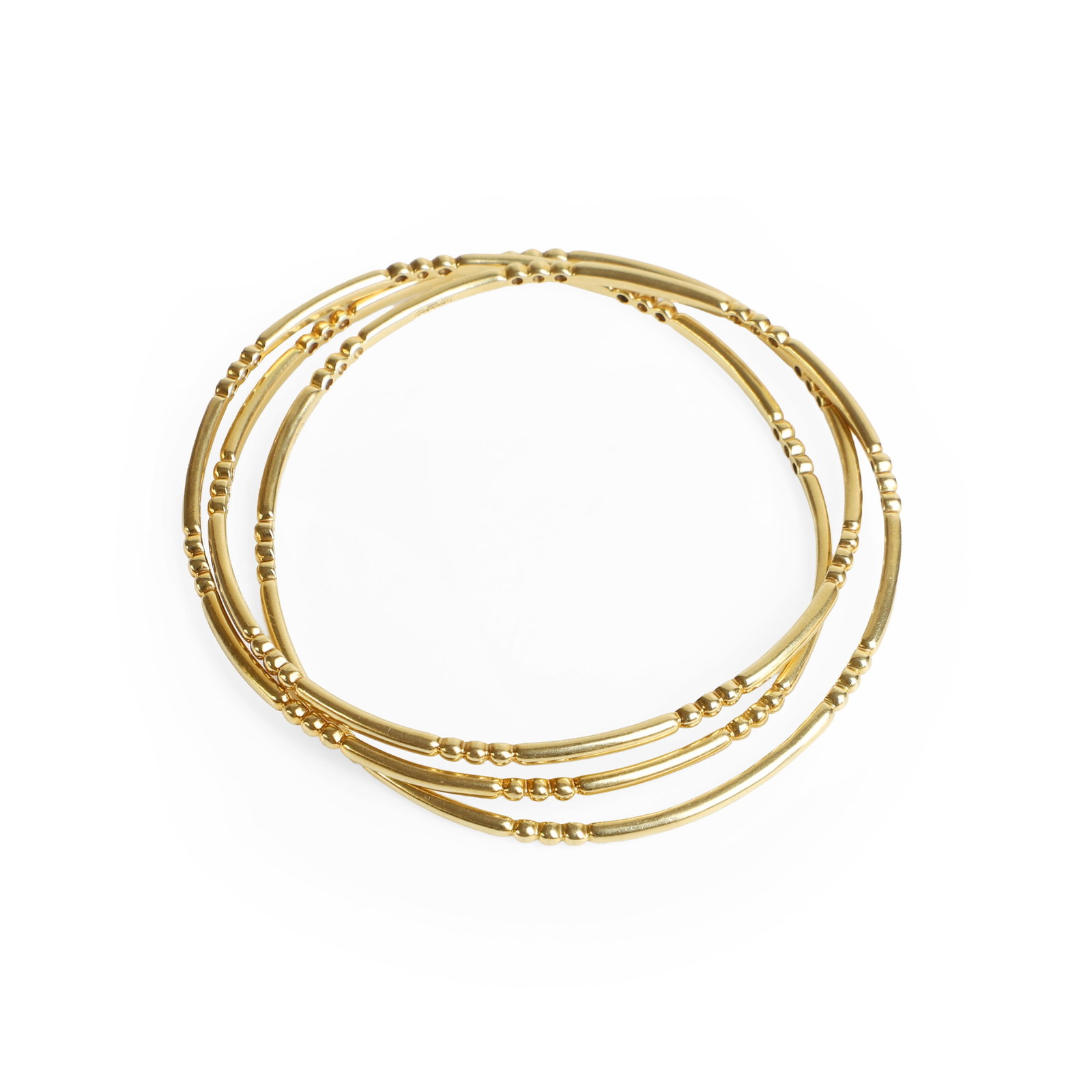Garrard & Co., a set of three 18ct gold conjoined bangles,: Garrard & Co., a set of three 18ct gold conjoined bangles, with interspaced beaded sections, stamped 'Garrard One One Two', sponsor mark G&Co, London import hallmark 1989, with maker's case (Internal 