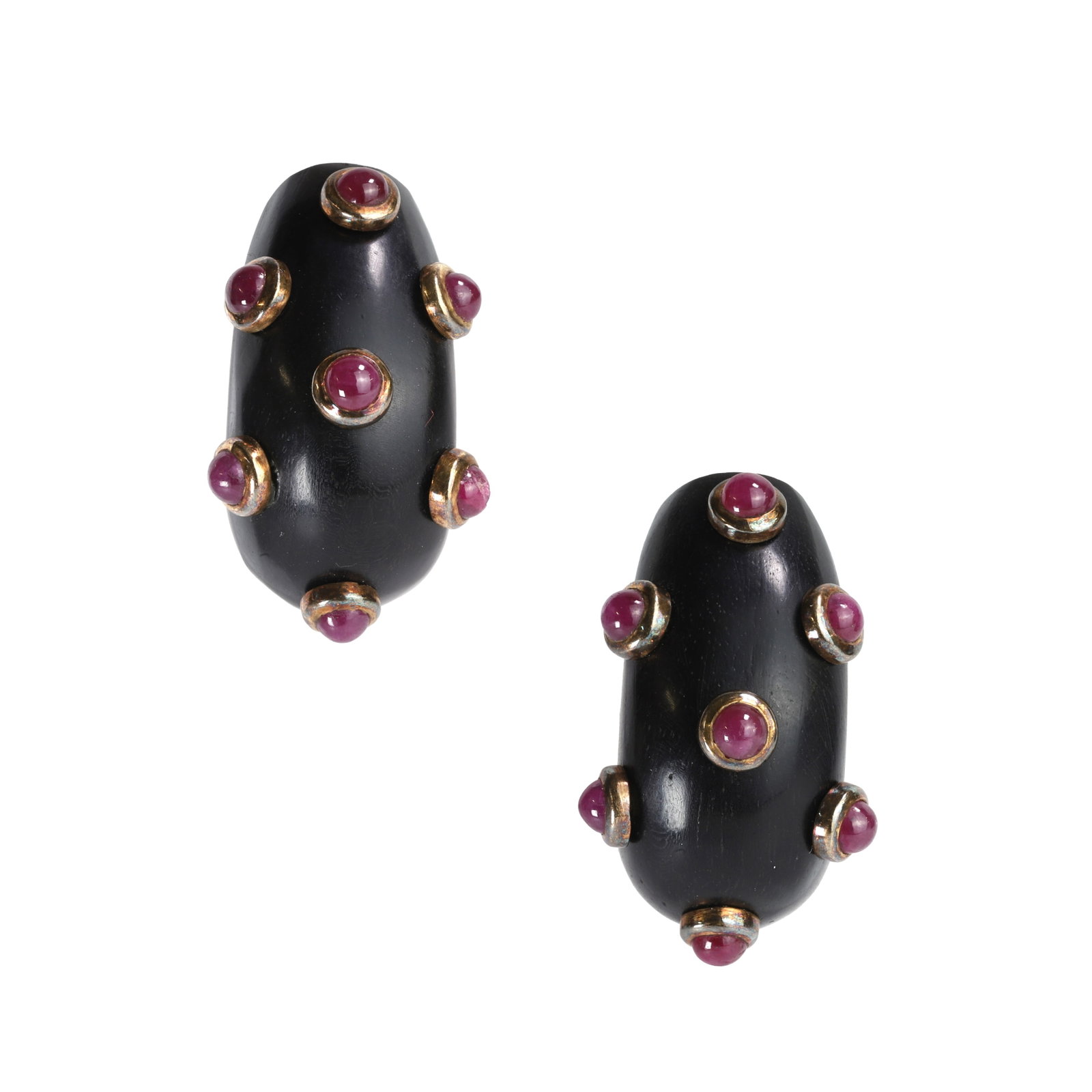 L'Oree du Bois, a pair of ebony and ruby set earrings,: L'Oree du Bois, a pair of ebony and ruby set earrings, of elongated, domed half hoop form, each studded with seven round cabochon rubies in gold 'doughnut' settings, with hinged clasp fitting and plas