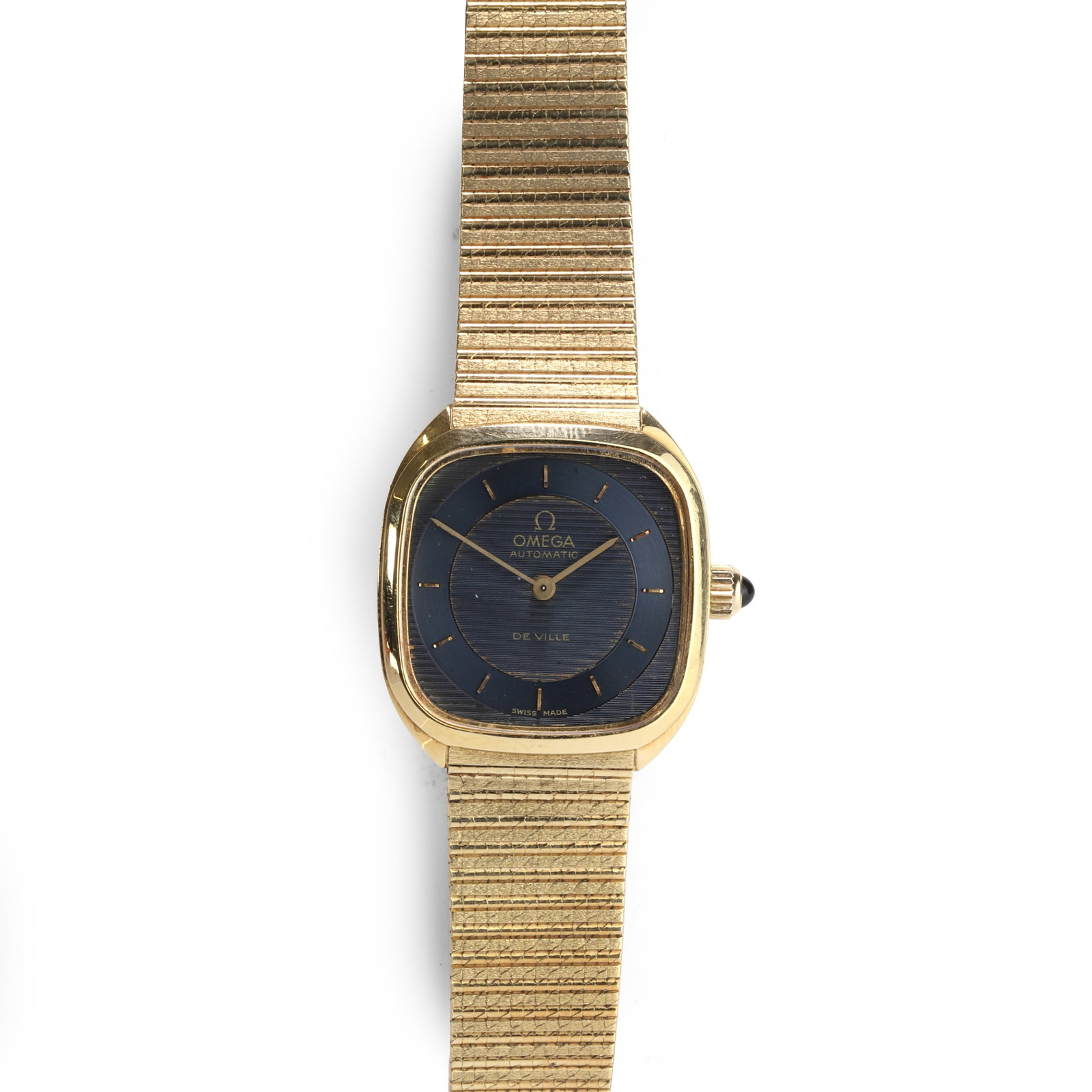 Omega, an 18ct gold De Ville automatic bracelet watch,: Omega, an 18ct gold De Ville automatic bracelet watch, the cushion-shaped 18ct gold case with a textured charcoal dial, raised gilt hour batons, gilt pencil hands, cabochon-topped crown, snap-off case