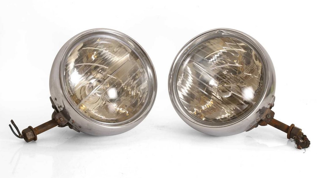 A pair of Marchal 'AB TP 347' lights, circa 1930s,: A pair of Marchal 'AB TP 347' lights, circa 1930s, the fluted lenses inscribed with the Marchal scrolled logo and 'T.P 347', the chrome housings with swivel bolts to the base on spherical mounts (26cm
