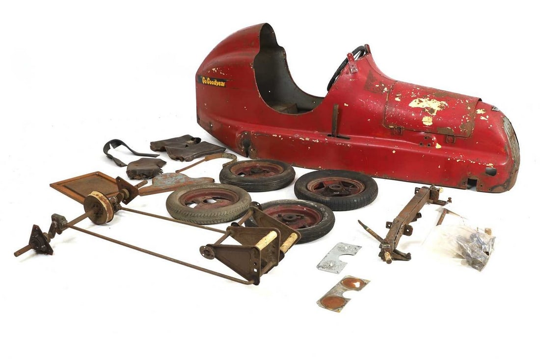 An Austin Pathfinder pedal car, circa 1949,: An Austin Pathfinder pedal car, circa 1949, a project for restoration, complete with wheels, axles and seat back, lacking seat squabs, bonnet straps, exhaust, screen, rear bumper and bonnet badge (155