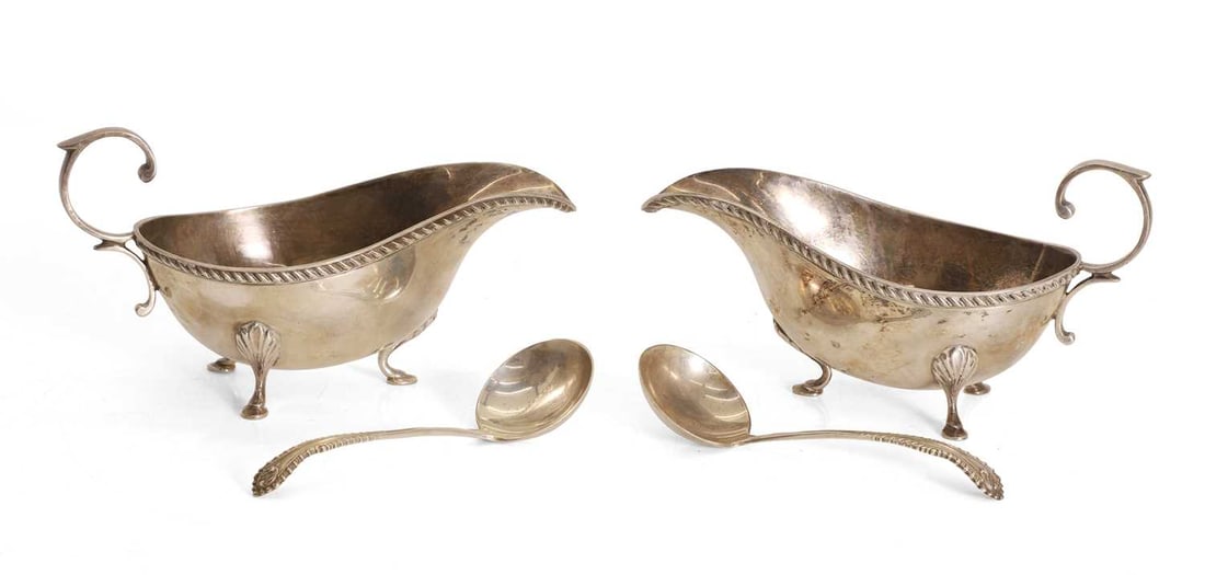 A pair of silver sauce boats,: A pair of silver sauce boats, by Joseph Gloster Ltd, Birmingham, 1973, together with matching ladles dated 1972, with beaded rims and on shaped feet Sauce boats, 17.5cm wide, 13.1ozt 4