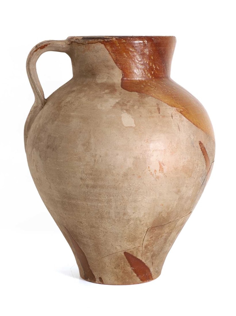 A French terracotta semi glazed jug, 18th / 19th century, - 2