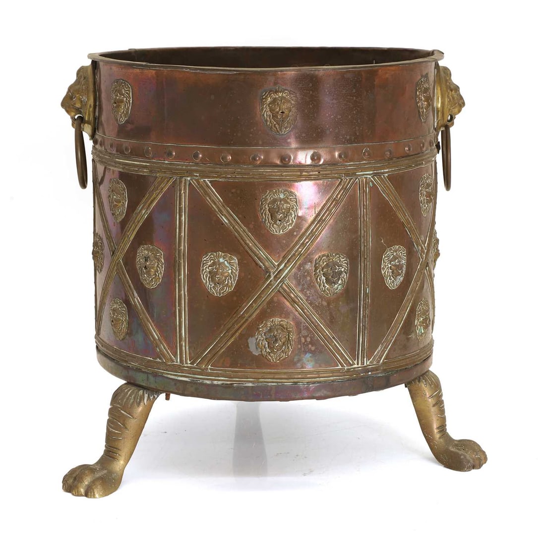 A Dutch style brass log bin, 20th century,: A Dutch style brass log bin, 20th century, with paw feet and lion mask handles, and lion motifs to the panels, with a studded date mark 39cm wide, 38cm high