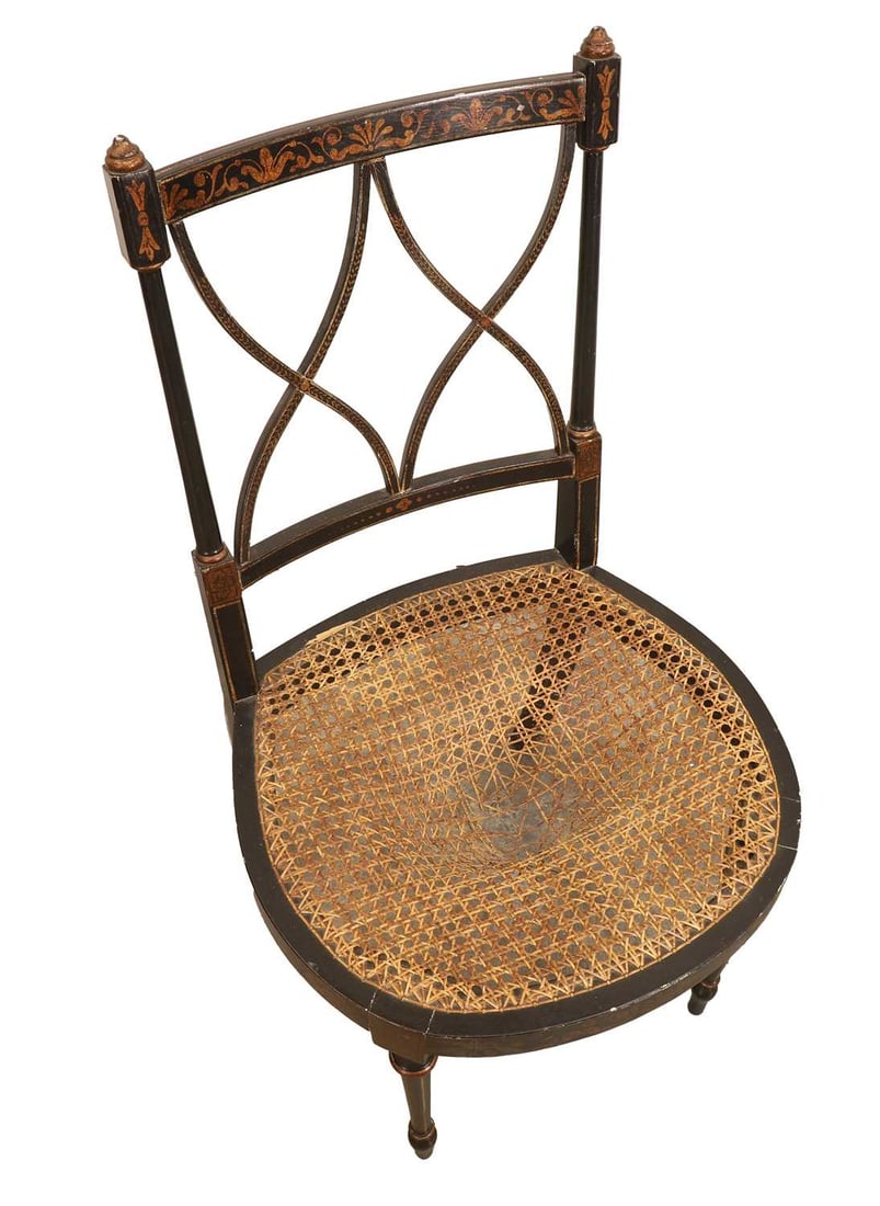 A late Regency style ebonised and parcel gilt cane chair, 19th century, - 2