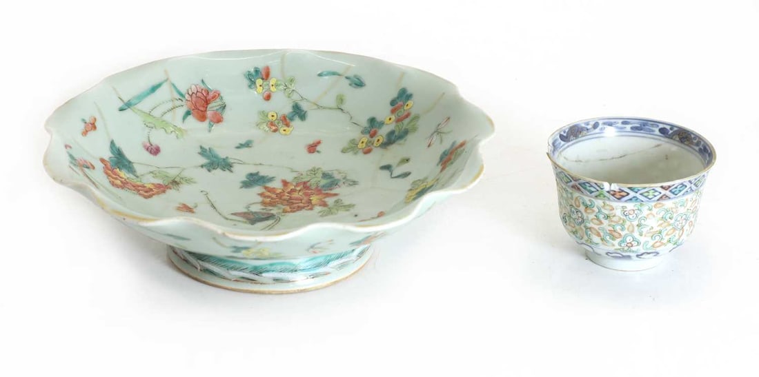 A Chinese canton famille rose bowl, 19th century,: A Chinese canton famille rose bowl, 19th century, of circular form with a shaped rim, enamelled in polychrome with butterflies and flowering foliage, together with a Chinese enamelled teabowl, late