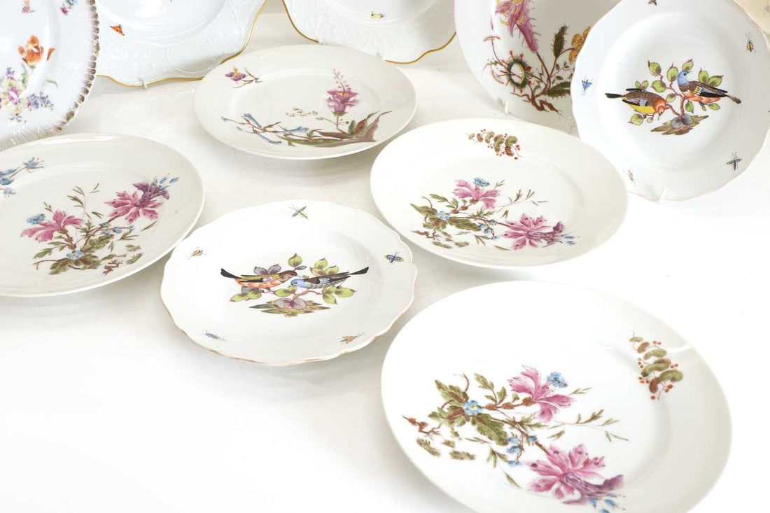 A collection of Continental porcelain plates, 20th century, - 2