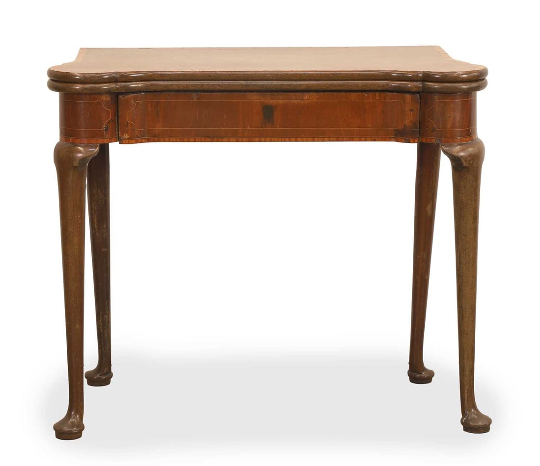 A George II mahogany and satinwood crossbanded card table, mid 18th century,: A George II mahogany and satinwood crossbanded card table, mid 18th century, the shaped foldover top, above a frieze drawer on cabriole supports 85cm wide, 41.2cm deep, 72.5cm high Condition Report: