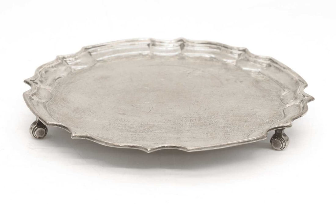 A small silver salver, (1 of 2)