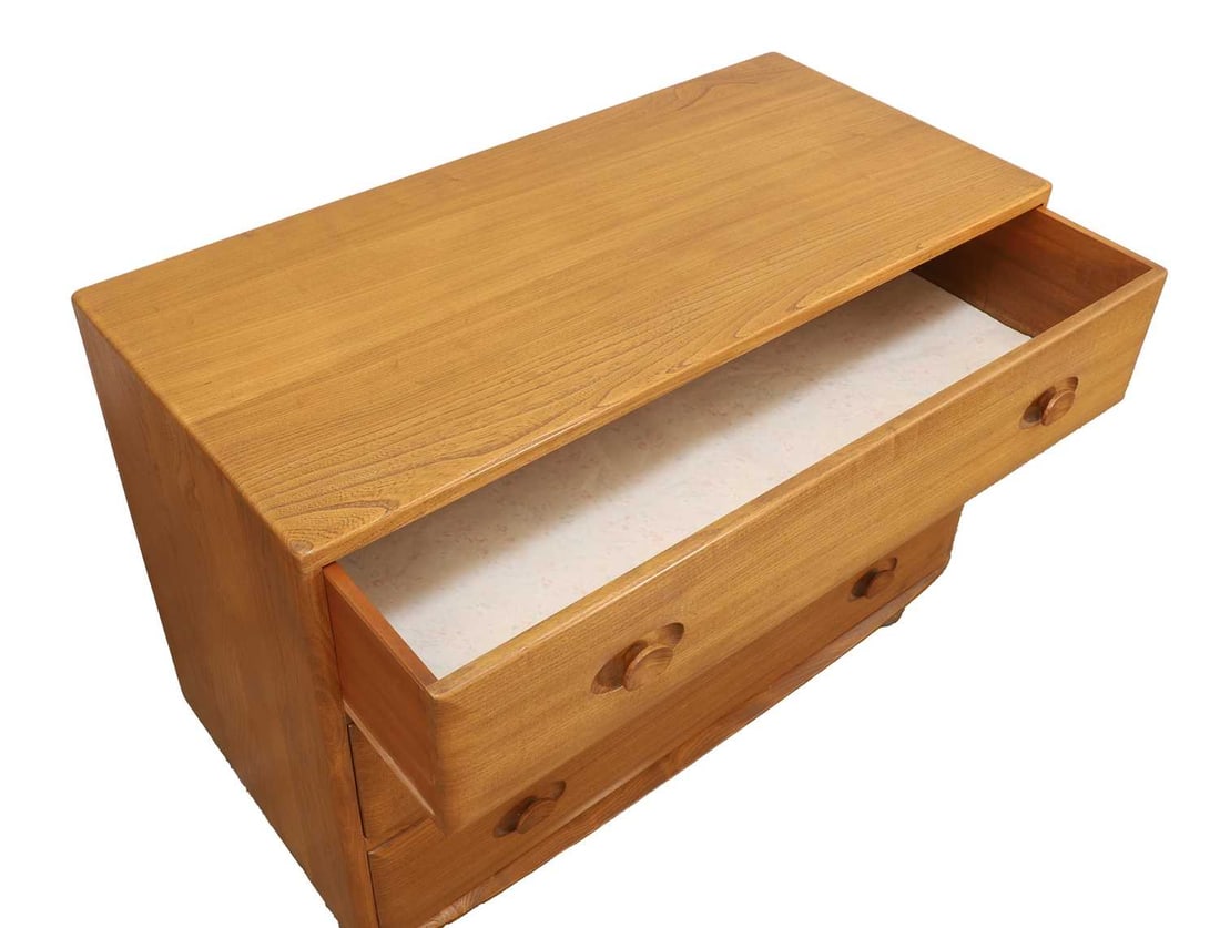 A pair of Ercol 'Windsor' chest of drawers, circa 1960s, designed by Lucian Ercolani, - 2