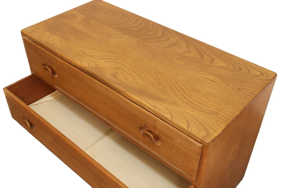 A pair of Ercol 'Windsor' chest of drawers, circa 1960s, designed by Lucian Ercolani, - 3