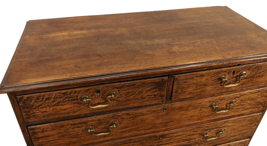 A George III 'tiger' oak chest of drawers, third quarter 18th century, - 2