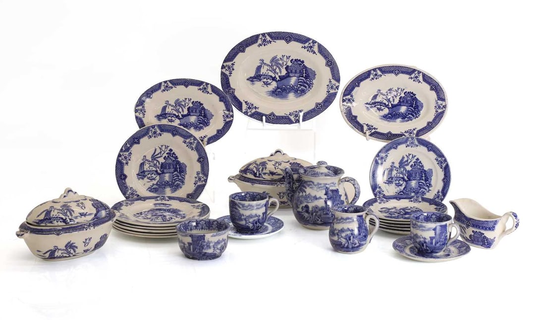 A Cauldon blue and white toy tea service, 20th century,: A Cauldon blue and white toy tea service, 20th century, comprising a teapot, two teacups, a milk jug, fourteen saucers of various sizes, three serving plates, a bowl, two lidded tureens, and a sauce