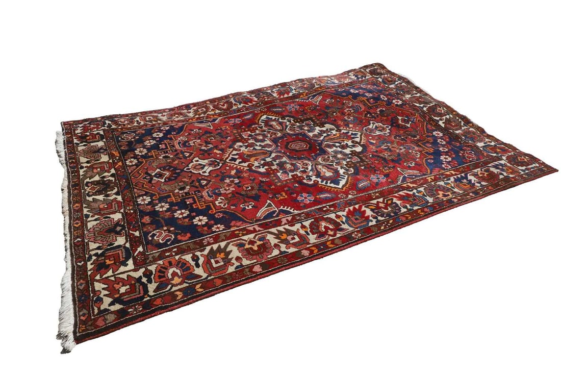A Heriz carpet, (1 of 2)